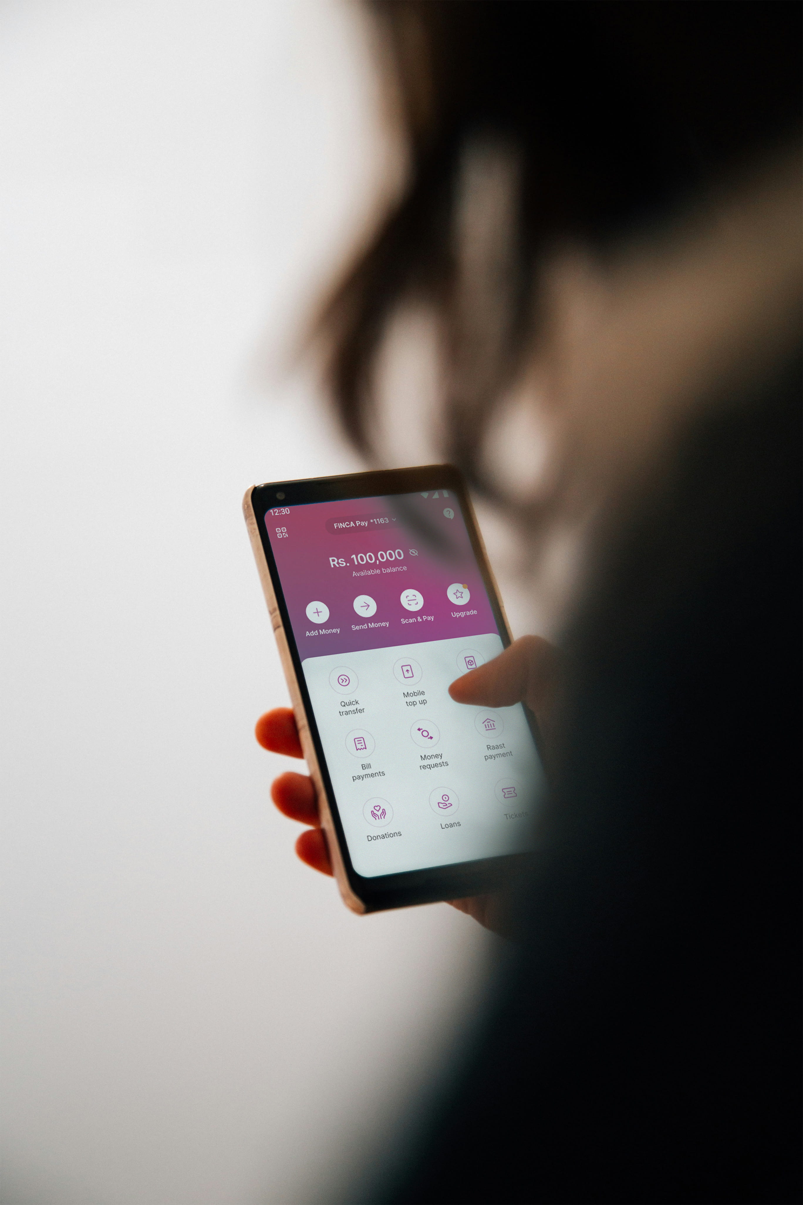 FINCA mobile app on a smartphone